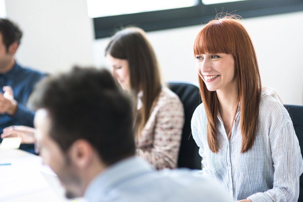 TITAN internships: depiction of young people in a meeting