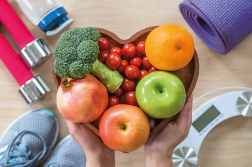 A colorful heart shaped boll of fruits to promote good health and wellbeing in TITAN Greece, case study.